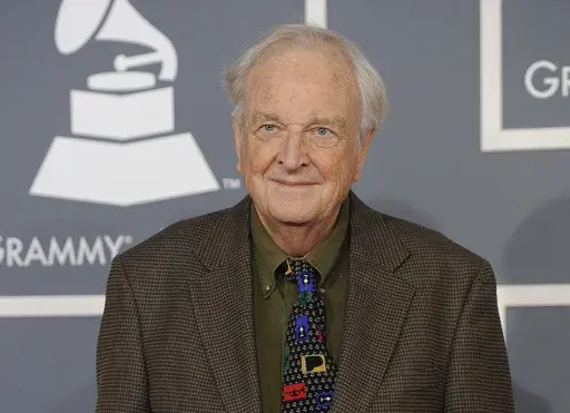 Chris Strachwitz arrives at the 54th annual GRAMMY Awards on Feb. 12, 2012, in Los Angeles. Strachwitz, a producer, musicologist and one-man preservation society whose Arhoolie Records released thousands of songs by regional performers and comprised an extraordinary American archive that became known and loved worldwide, died Friday, May 5, 2023, according to the Arhoolie Foundation. He was 91. (AP Photo/Chris Pizzello, File)