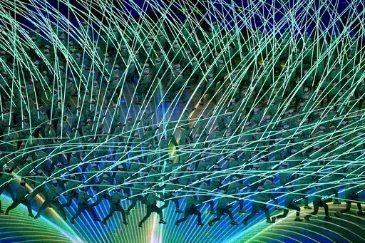 Dancers perform during the opening ceremony of the 2022 Winter Olympics, Friday, Feb. 4, 2022, in Beijing. (AP Photo/Ashley Landis)