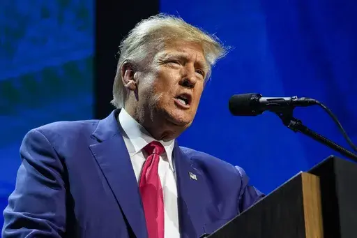 Former President Donald Trump speaks at the National Rifle Association Convention in Indianapolis, Friday, April 14, 2023. Trump has raised more than $34 million for his 2024 campaign since the start of the year, according to his campaign. (AP Photo/Michael Conroy, File)