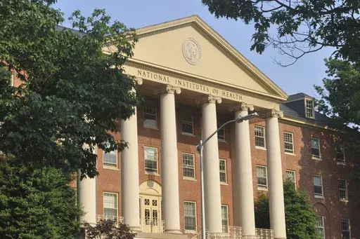 This photo provided by the National Institutes of Health shows the James H. Shannon Building on the NIH campus in Bethesda, Md., in 2015. (Lydia Polimeni/NIH via AP)