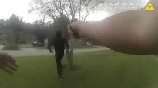 In this image taken from Jacksonville (Florida) Sheriff's Office body camera video, suspect Le'Keian Woods is hit with a Taser stun gun as he is chased by a Jacksonville police officer after fleeing a vehicle that was stopped during a traffic stop Friday, Sept. 29, 2023, in Fla. A Florida sheriff released the body camera video Monday, Oct. 2, that he says shows his officers were justified when they repeatedly punched, elbowed and kneed Woods, a drug suspect, who gave chase after being pulled ove