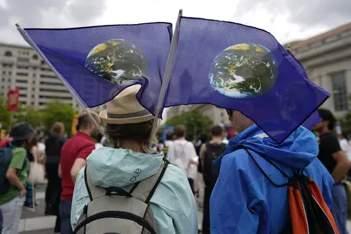 Climate activists hold a rally to protest the use of fossil fuels on Earth Day at Freedom Plaza, April 22, 2023, in Washington. (AP Photo/Carolyn Kaster, File)