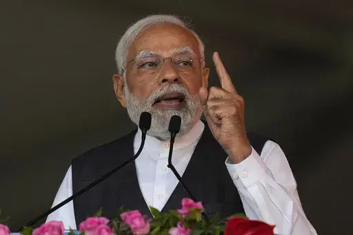 FILE- Indian Prime Minister Narendra Modi speaks at a rally in Mumbai, India, Thursday, Jan. 19, 2023. Modi says his country strongly condemns the civilian deaths taking place during the Israel-Hamas war. During his speech at a virtual summit of more than 100 developing countries Friday, Nov. 17, 2023, Modi urged the leaders of the developing countries to unite in the face of growing challenges rising due to the war. Modi also condemned the Oct. 7 attack by the militant group Hamas. (AP Photo/Ra