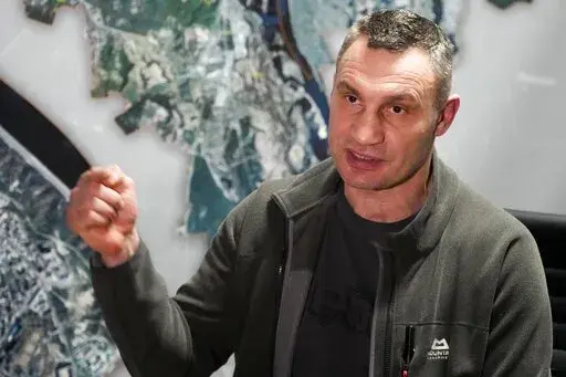 Vitali Klitschko, Kyiv Mayor and former heavyweight champion gestures while speaking during his interview with the Associated Press in his office in the City Hall in Kyiv, Ukraine, Sunday, Feb. 27, 2022. A Ukrainian official says street fighting has broken out in Ukraine's second-largest city of Kharkiv. Russian troops also put increasing pressure on strategic ports in the country's south following a wave of attacks on airfields and fuel facilities elsewhere that appeared to mark a new phase of 