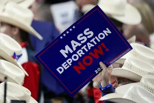 A member of the Texas delegation holds a sign during the Republican National Convention July 17, 2024, in Milwaukee. (AP Photo/Matt Rourke, File)