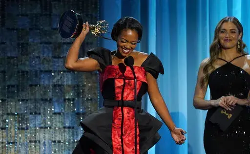 Mishael Morgan accepts the award for outstanding performance by a lead actress in a drama series for her role in "The Young and the Restless" at the 49th annual Daytime Emmy Awards on Friday, June 24, 2022, in Pasadena, Calif. (AP Photo/Chris Pizzello)