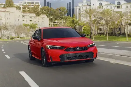 This photo provided by Honda shows the 2025 Civic. The Civic is newly available with a hybrid powertrain that gets up to an EPA-estimated 49 mpg in combined city/highway driving. (Courtesy of American Honda Motor Co. via AP)