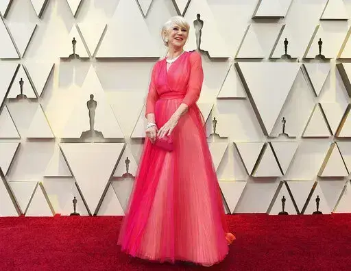 Helen Mirren arrives at the Oscars in Los Angeles on Feb. 24, 2019. Mirren will grace the cover of People magazine’s “The Beautiful Issue."  (Photo by Jordan Strauss/Invision/AP, File)
