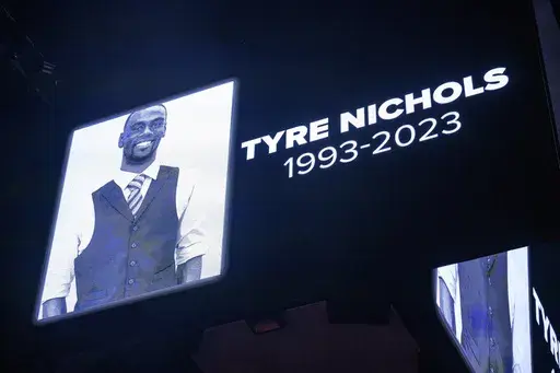 The screen at the Smoothie King Center in New Orleans honors Tyre Nichols before an NBA basketball game, Jan. 28, 2023. (AP Photo/Matthew Hinton, File)
