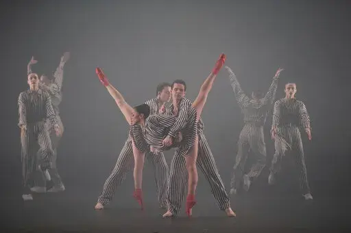 In this photo provided by New York City Center, dancers appear in "Twyla Tharp: In the Upper Room & Nine Sinatra Songs" at New York City Center on Oct. 19, 2022, in New York. (Christopher Duggan/New York City Center via AP)