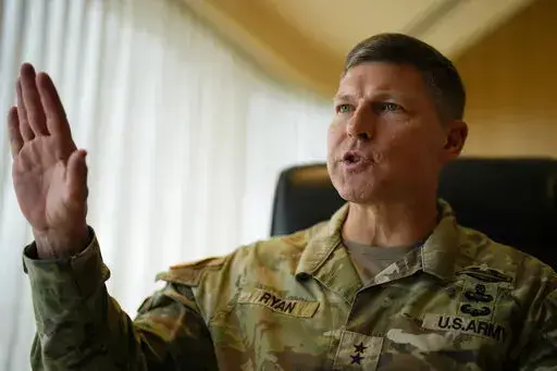 Commanding General of the U.S. Army's 25th Infantry Division based in Hawaii, Maj. Gen. Joseph Ryan gestures as he speaks to The Associated Press in Manila, Philippines on Wednesday, Feb. 8, 2023. Ryan said American forces and their allies in Asia, including the Philippines, are ready for battle after years of joint combat exercises and added that Russia's war setbacks in Ukraine should serve as a warning to potential Asian aggressors like China and North Korea. (AP Photo/Aaron Favila)