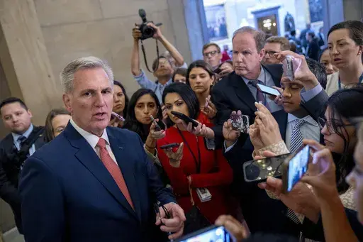House Speaker Kevin McCarthy of Calif. speaks to reporters outside his office on Capitol Hill in Washington, June 7, 2023. McCarthy's bid to appease Republican hard-liners and get the House moving again after a recent party rebellion on the floor has some Democrats warning of a difficult road ahead when it comes to passing legislation that will keep the government running. (AP Photo/Andrew Harnik, File)